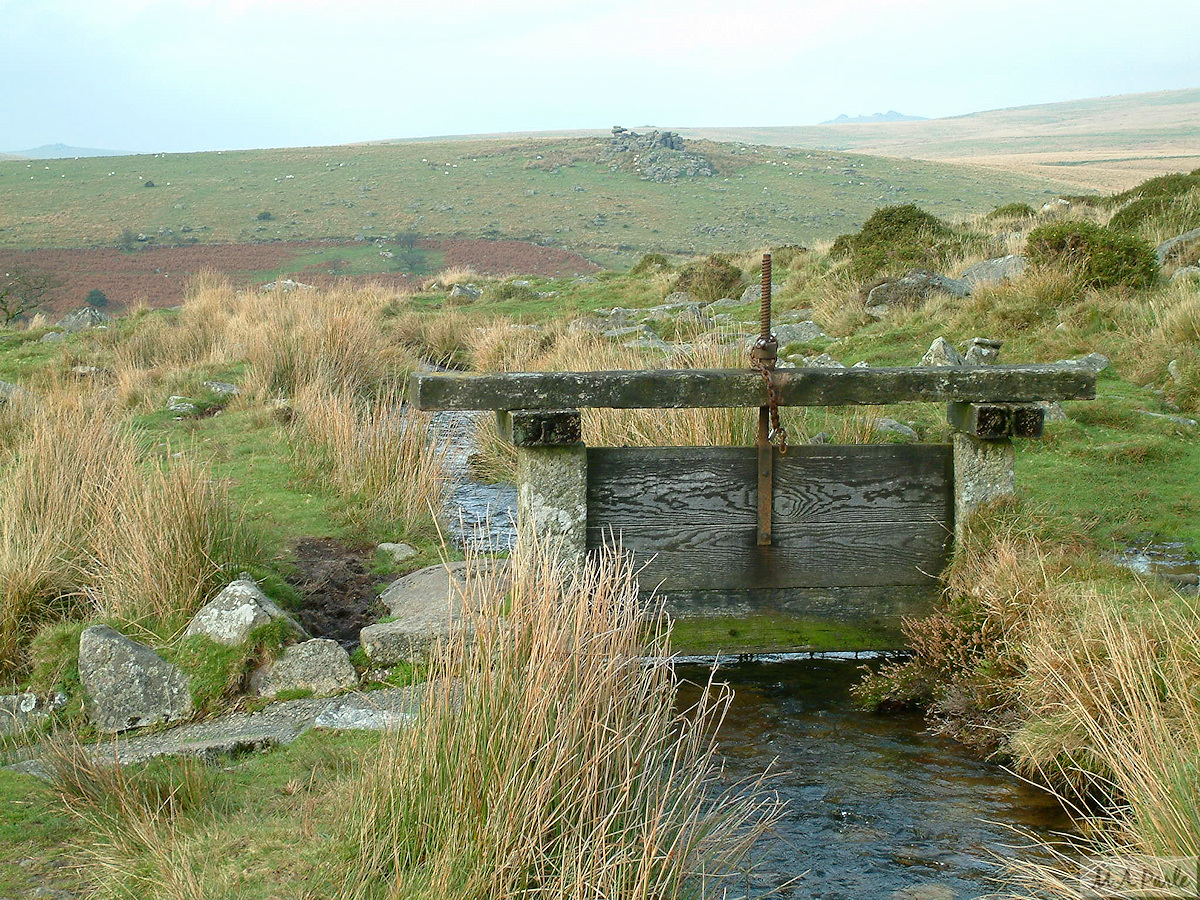 A sluice gate on the Devonport Leat, with Black Tor beyond